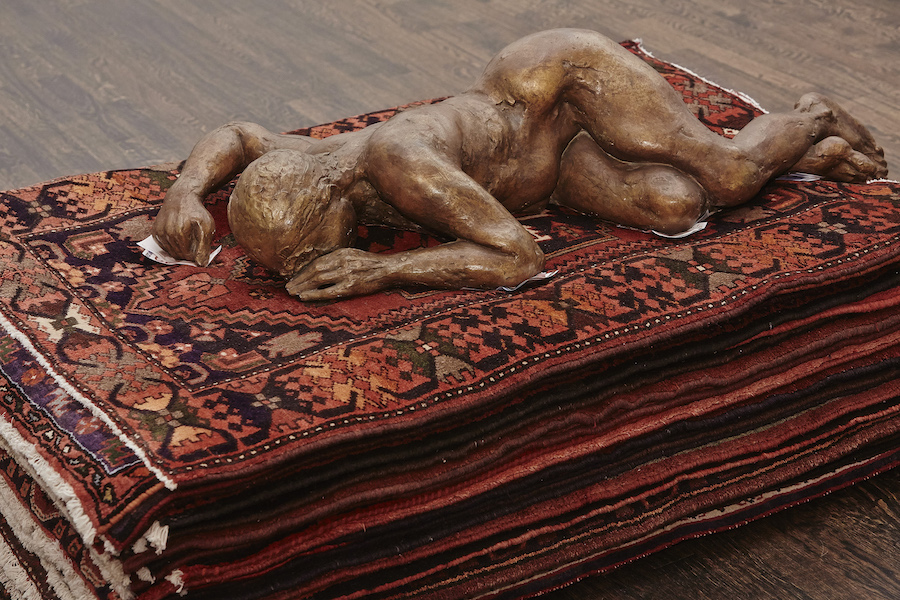Nina Beier Perfect Duty,   2014 (dettaglio / detail) Edgar Augustin Liegende (1966),   Bronzo / bronze,   14 Tappeti persiani / Persian carpets ,   170 EUR Courtesy the artist and Croy Nielsen,   Berlin