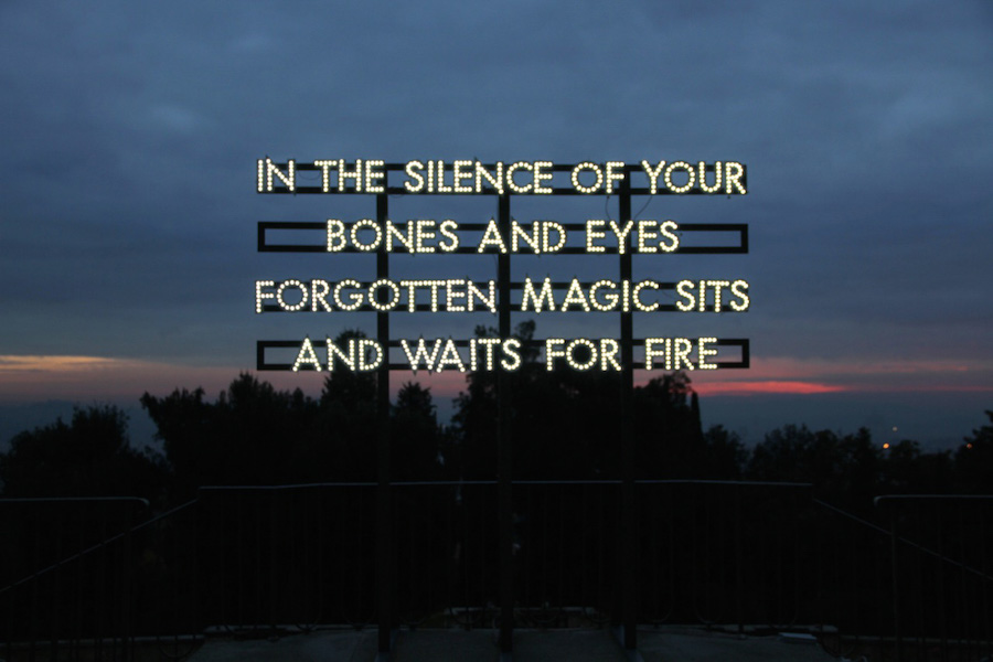 King Kong - Robert Montgomery,   In the silence of your bones,   2013,   led,   struttura in legno verniciata,   cm 280 x 315 – base cm 180,   Courtesy Analix Forever,   Ginevra