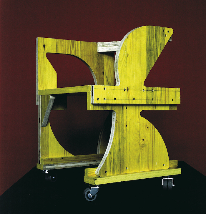 PR 55, serie Solidi, 1995 ca. Pannello di abete a tre strati rivestimento giallo, 70 x 50 x 50 cm.  Courtesy Archivio Architetto Cesare Leonardi. 