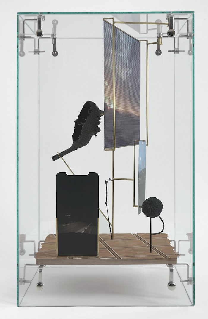 David Casini, Nirvana, 2019, glass, inlaid wood, brass, resin, tempered glass, aluminum, UV printing, 45 x 26 x 26 cm. 